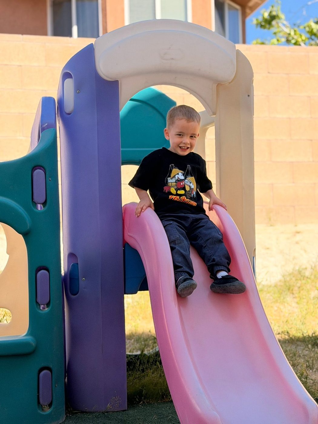 Child going down the playground slide